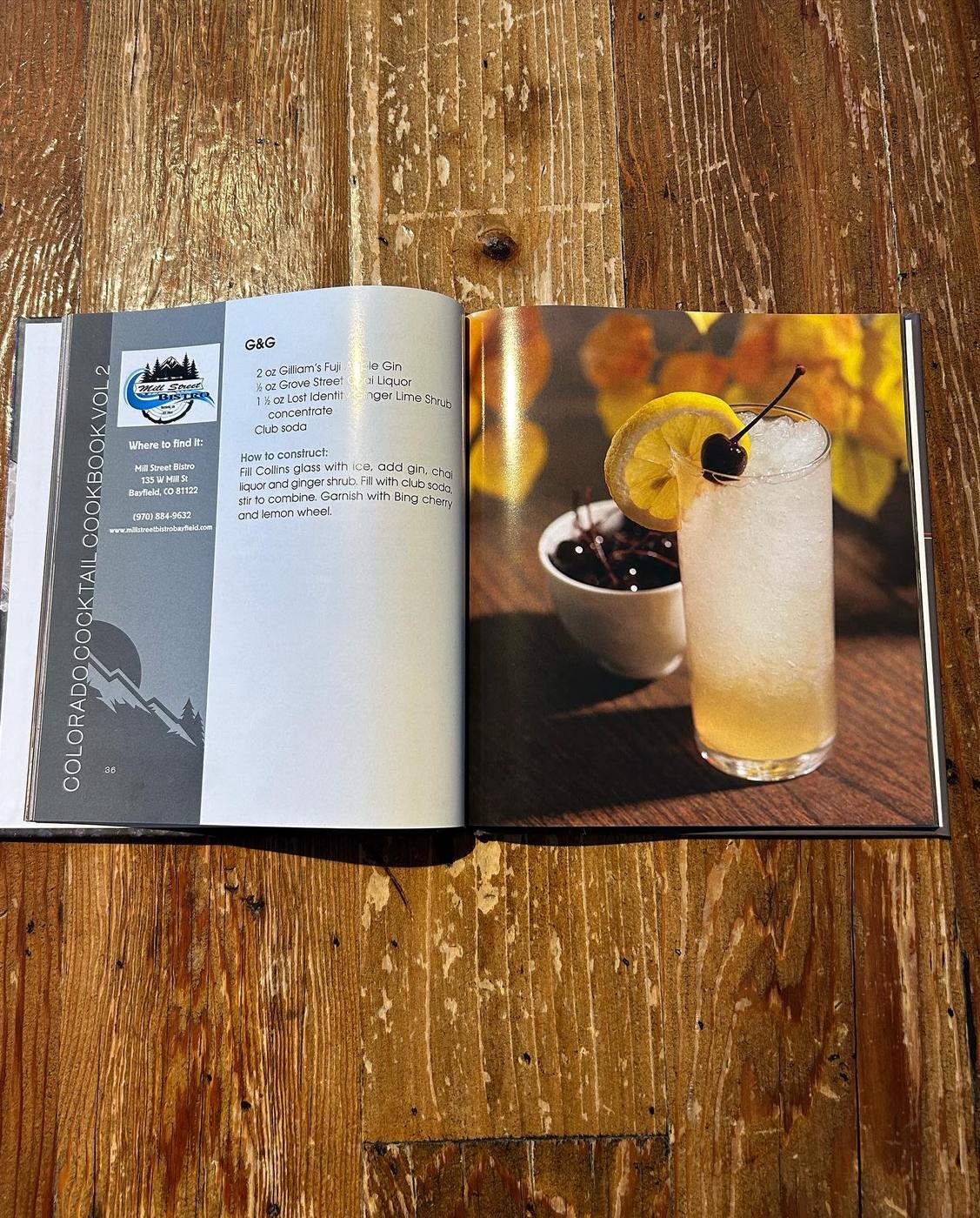 The Colorado Cocktail Cookbook open to the Mill Street Bistro page
