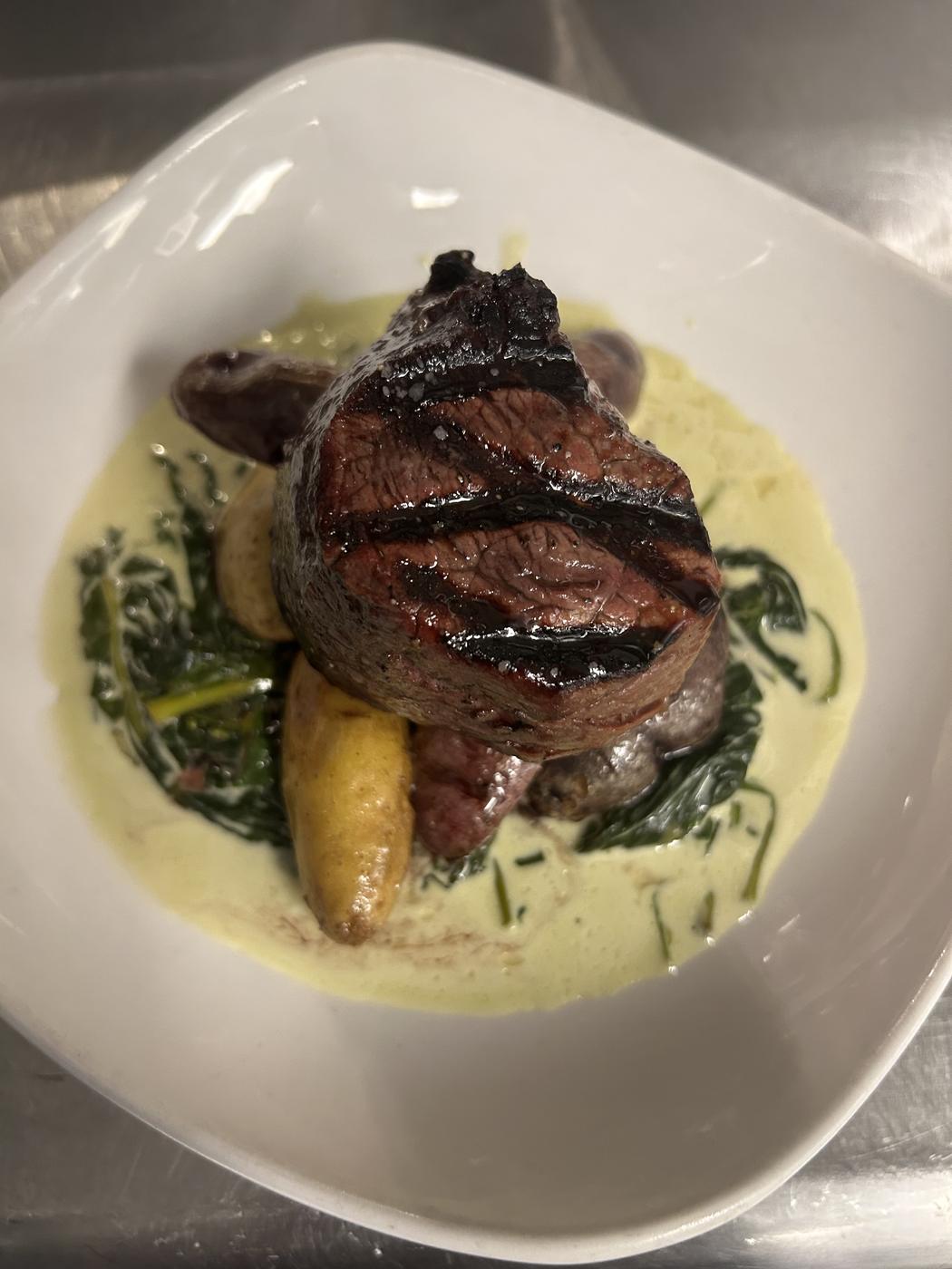 Grilled filet over spinach
