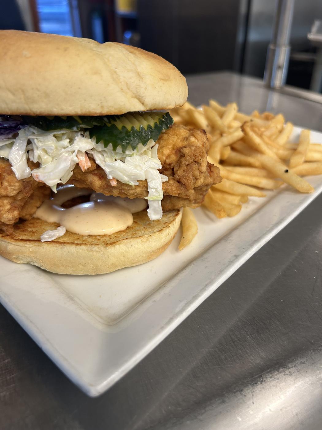 Fried chicken sandwich with fries