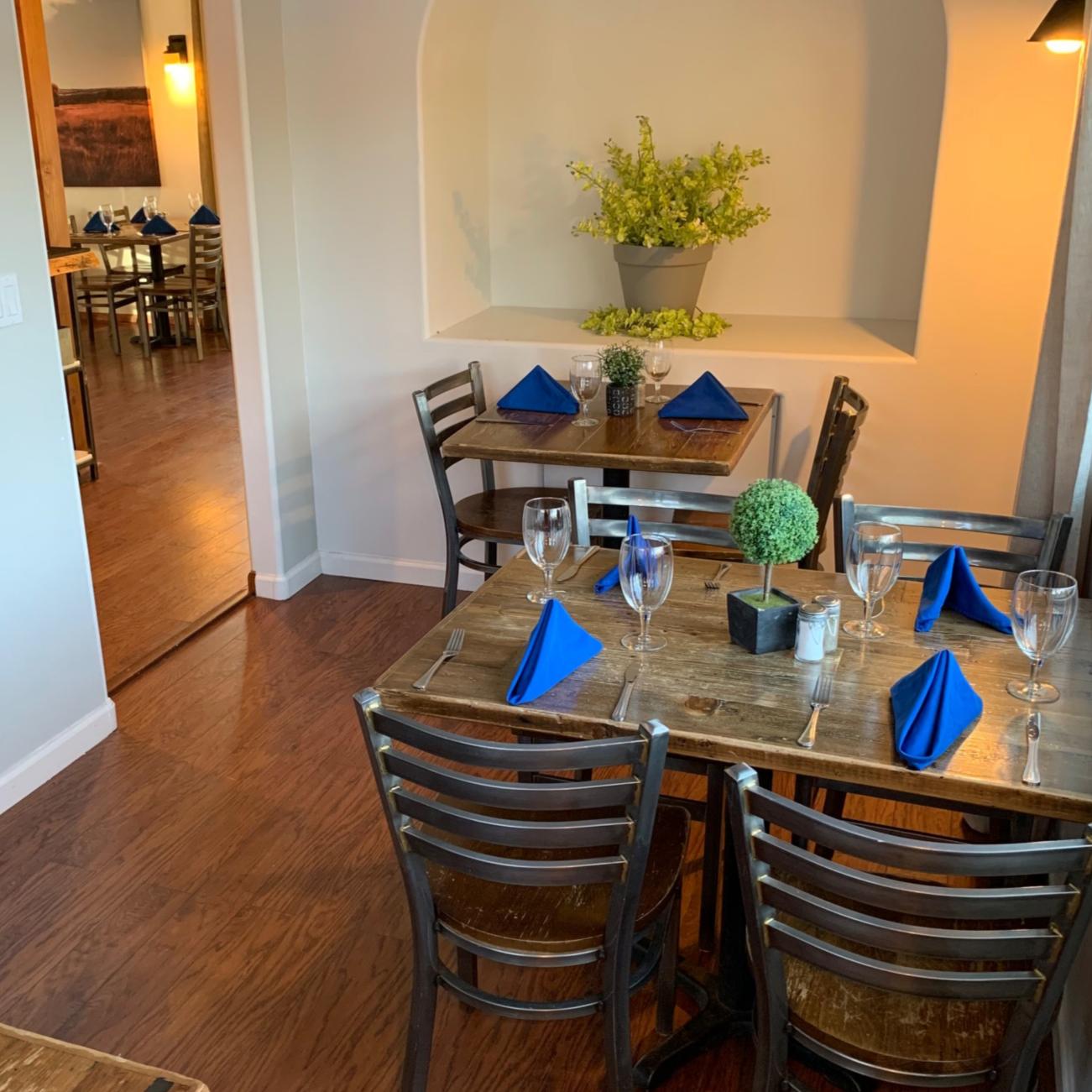 Tables set for dinner in the Mill Street Bistro dining room
